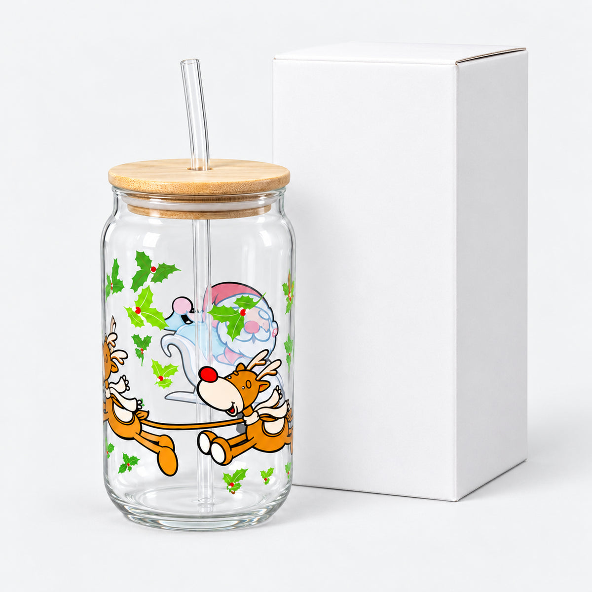 Santa and reindeer glass cup next to its white box