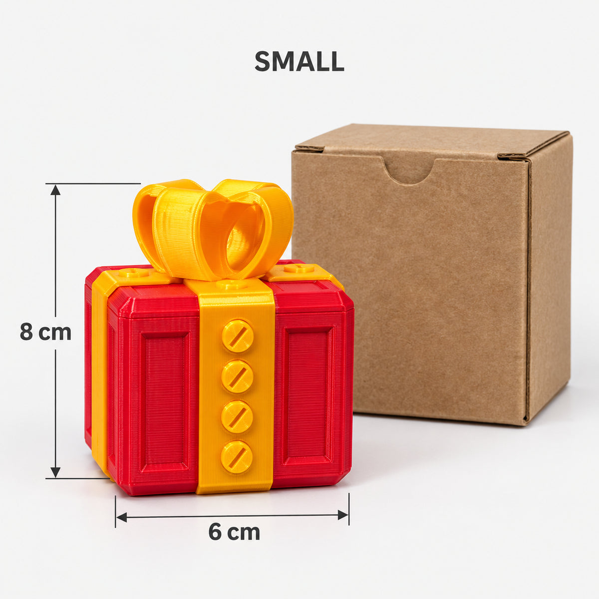 Small red & gold prank gift box next to its kraft box