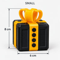 Small black & gold prank gift box with screws and a bow, 6 x 8 cm