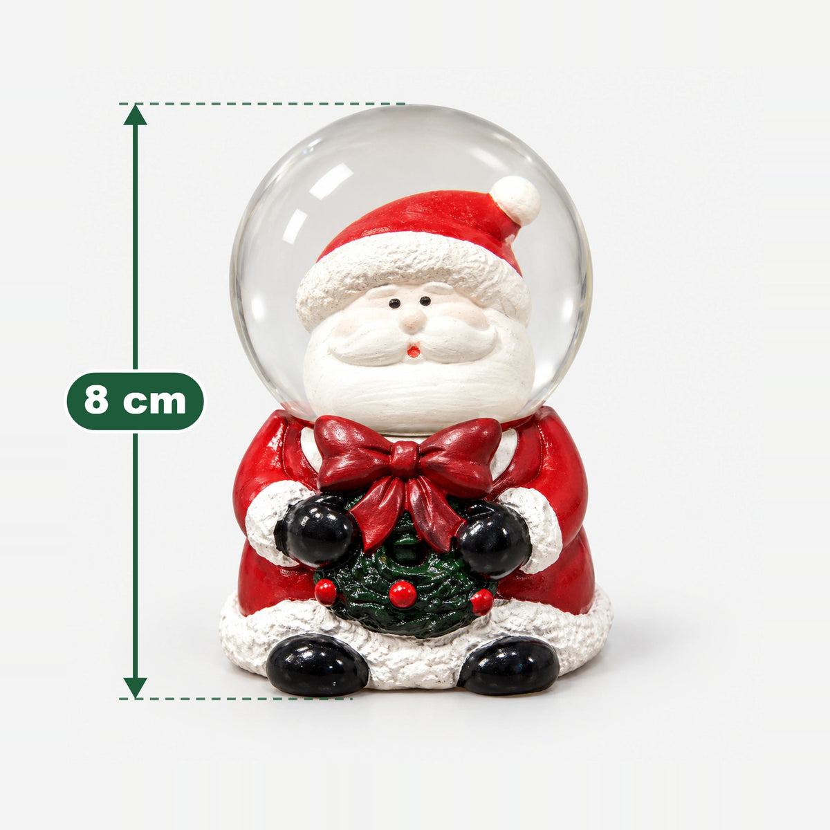 Santa with wreath Christmas snow globe measuring 8 cm high