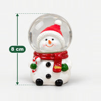 Snowman with candy cane Christmas snow globe measuring 8 cm high