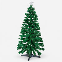 Green Christmas tree with star lights, a star topper and a black stand
