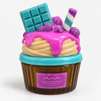 Turquoise chocolate cupcake perfume with a chocolate bar and pink drip