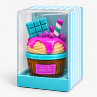 Turquoise chocolate cupcake perfume in its blue striped gift box