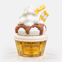 Whipped Pleasure cupcake perfume bottle with a whipped cream swirl and wafer sticks