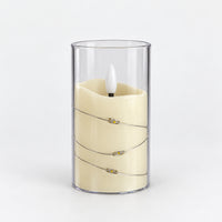 White 10cm LED candle in a clear cup with fairy lights, switched off