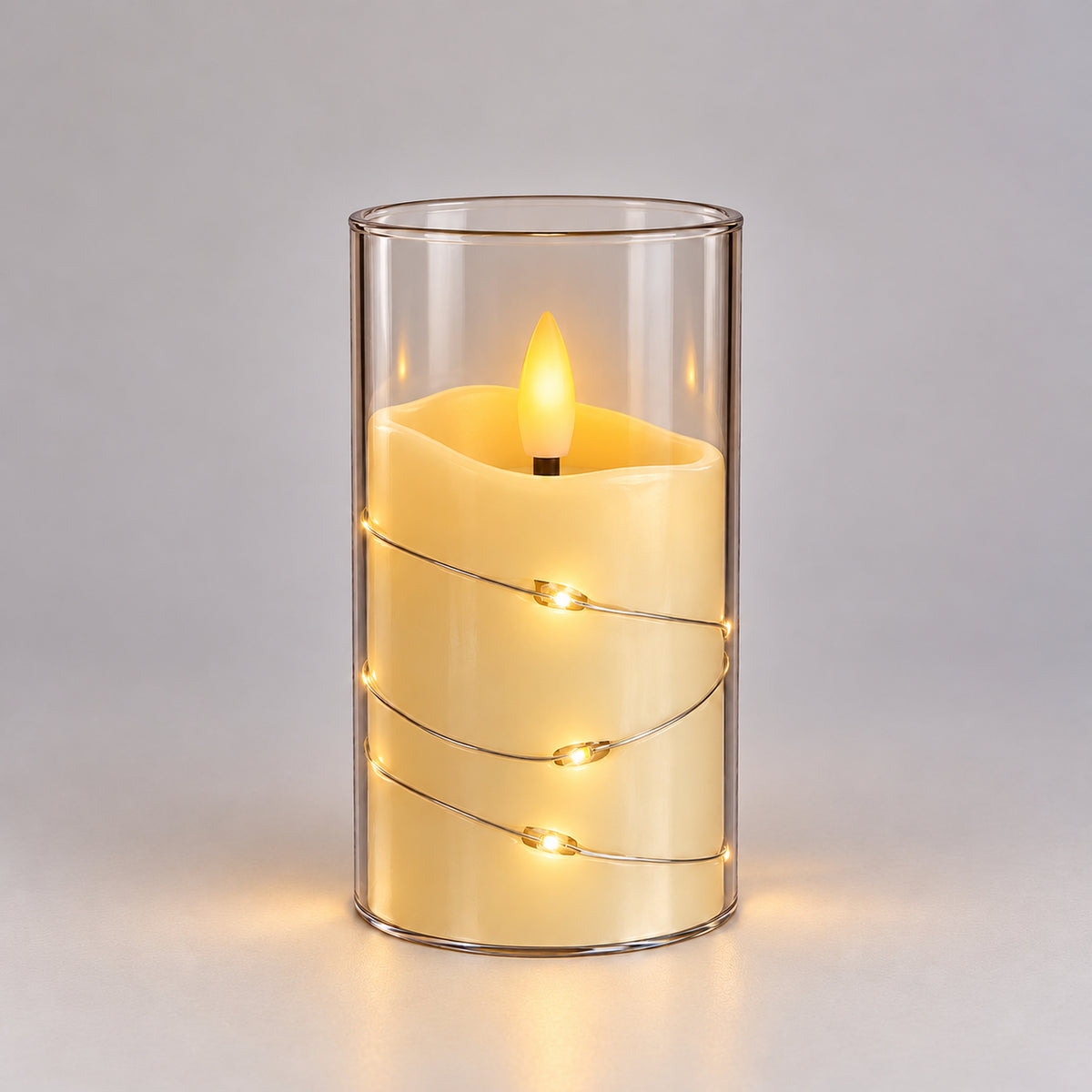 White 10cm LED candle cup glowing with warm fairy lights