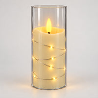 White 12.5cm LED candle cup glowing with warm fairy lights