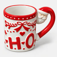 White HO Christmas mug with red details and a Santa on the handle