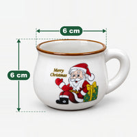 Large Santa with green gift rounded mug measuring 6 cm high and 6 cm wide at the top
